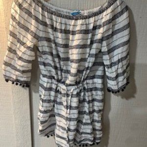 Sexy and fun black and white Women's swimsuit cover-up.  Good condition